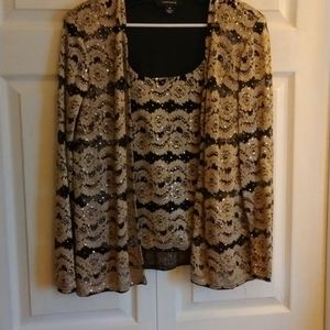 Long sleeve dressy top.  The Brand is R&M Richards